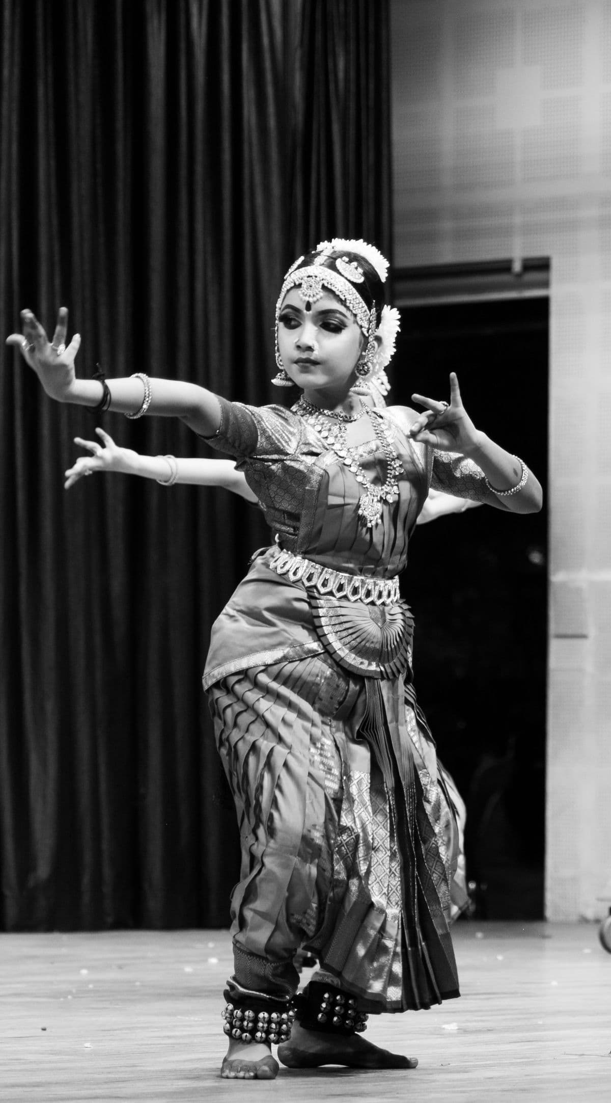 Bharatanatyam dancer in graceful motion — Raanaa International School